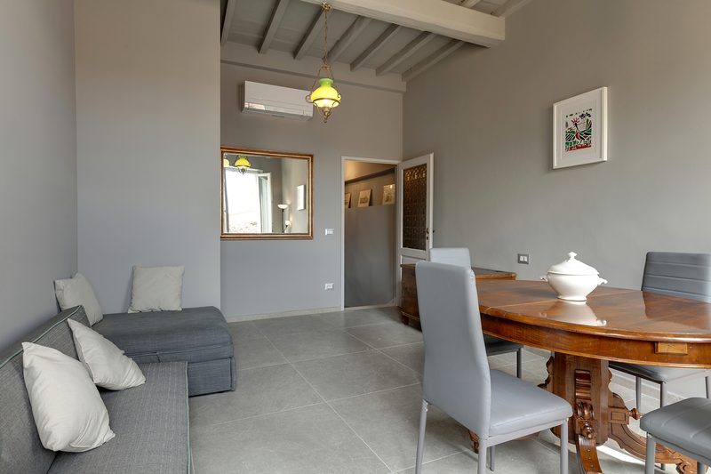 Zona living dell'Attico Guelfa 49
