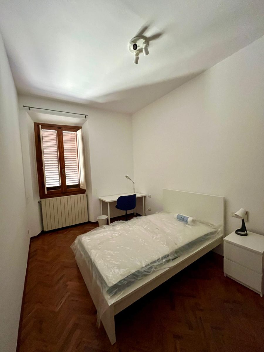 Camera da letto luminosa di Casa Ponte all'Asse 26